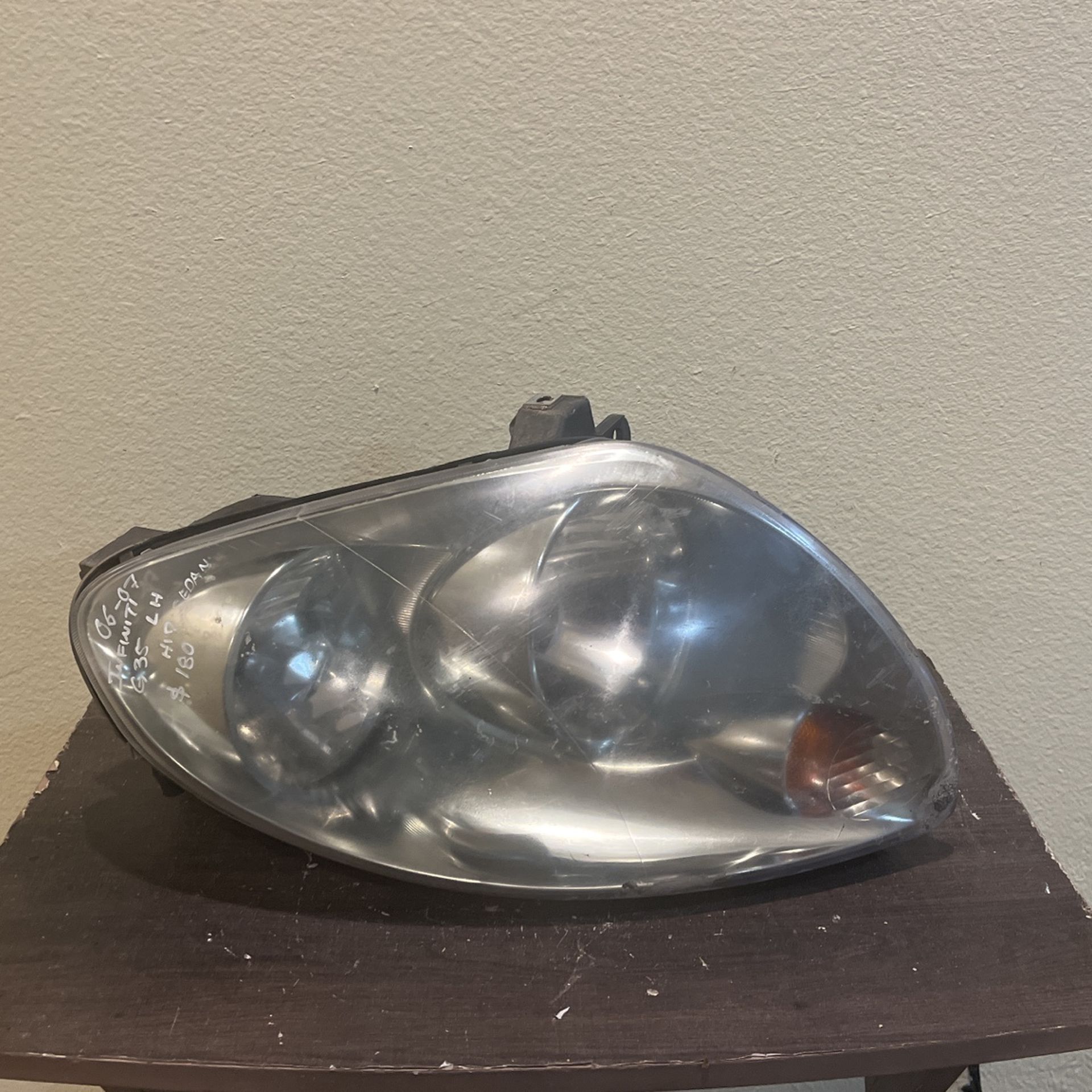 2006-2007 INFINITI G35 HEADLIGHT HID LH 