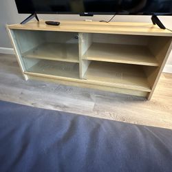 TV stand with storage space, shelving, sliding doors