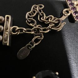 Thick Gokd Over Lay On Silver With Beads Hanging On Bottom. 