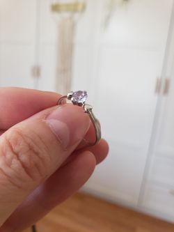 Size 6.5 ring with light purple rhinestonr