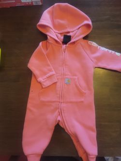 Baby girl Carheart sweater onesie.