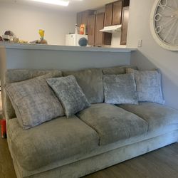 grey  couch for sell