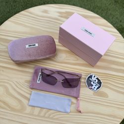 Miu Miu Omu Sunglasses - Grey