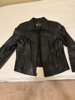 Leather jacket fits  M and L