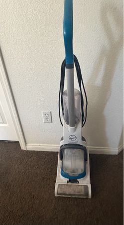 Two carpet cleaners