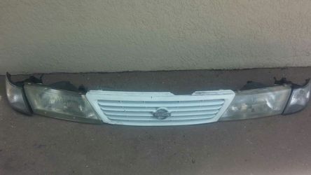 B14 sentra 95-99 se-r headlight grill corner combo