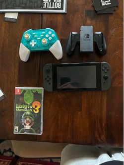 Nintendo switch black extra controller and game
