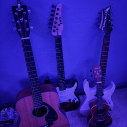 3 Guitars And 1 Ukulele 