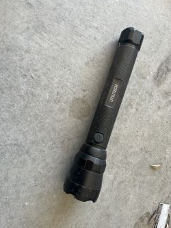 Utilitech Flashlight, Color is black
