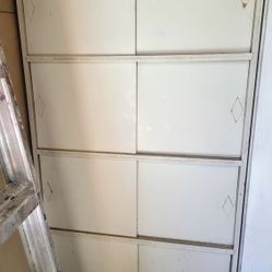 Free 5'x30" off White Cupboard With 4 shelves and closing Doors.