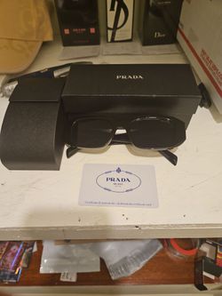 Prada sunglasses new with certified