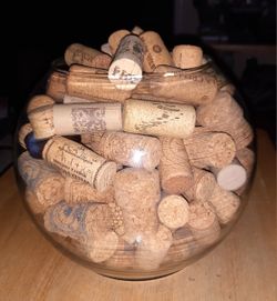 Clear Glass 7" Bowl Filled With A Collection Of Wine Corks