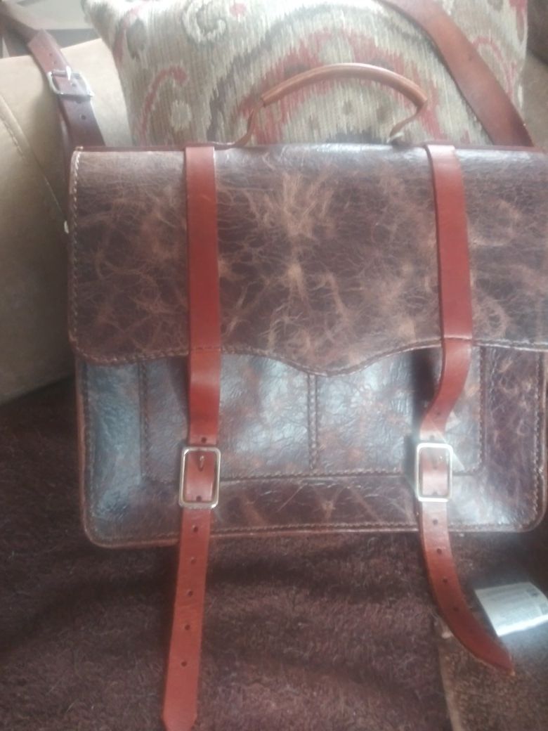 Messenger bag / satchel good for books or laptop.all real leather except the buckles