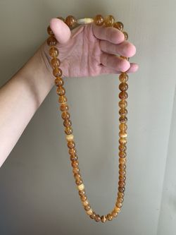 Vintage horn beaded necklace in a honey, amber color