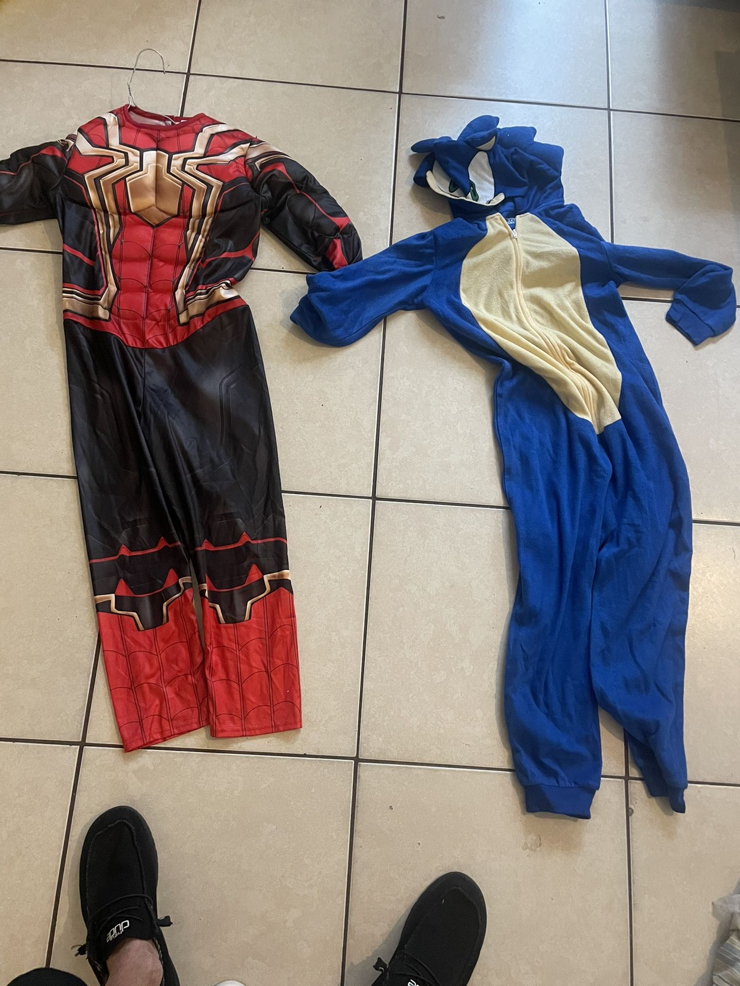 Halloween costumes for a nine or 10-year-old boy taking 50 for both brand new