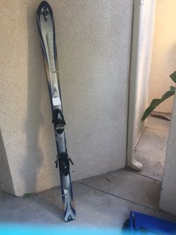 T nine K2 skis and Leki poles 110 cm.