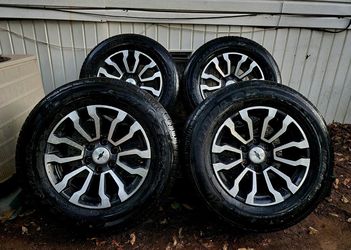 18” OEM Chevy rims with tires