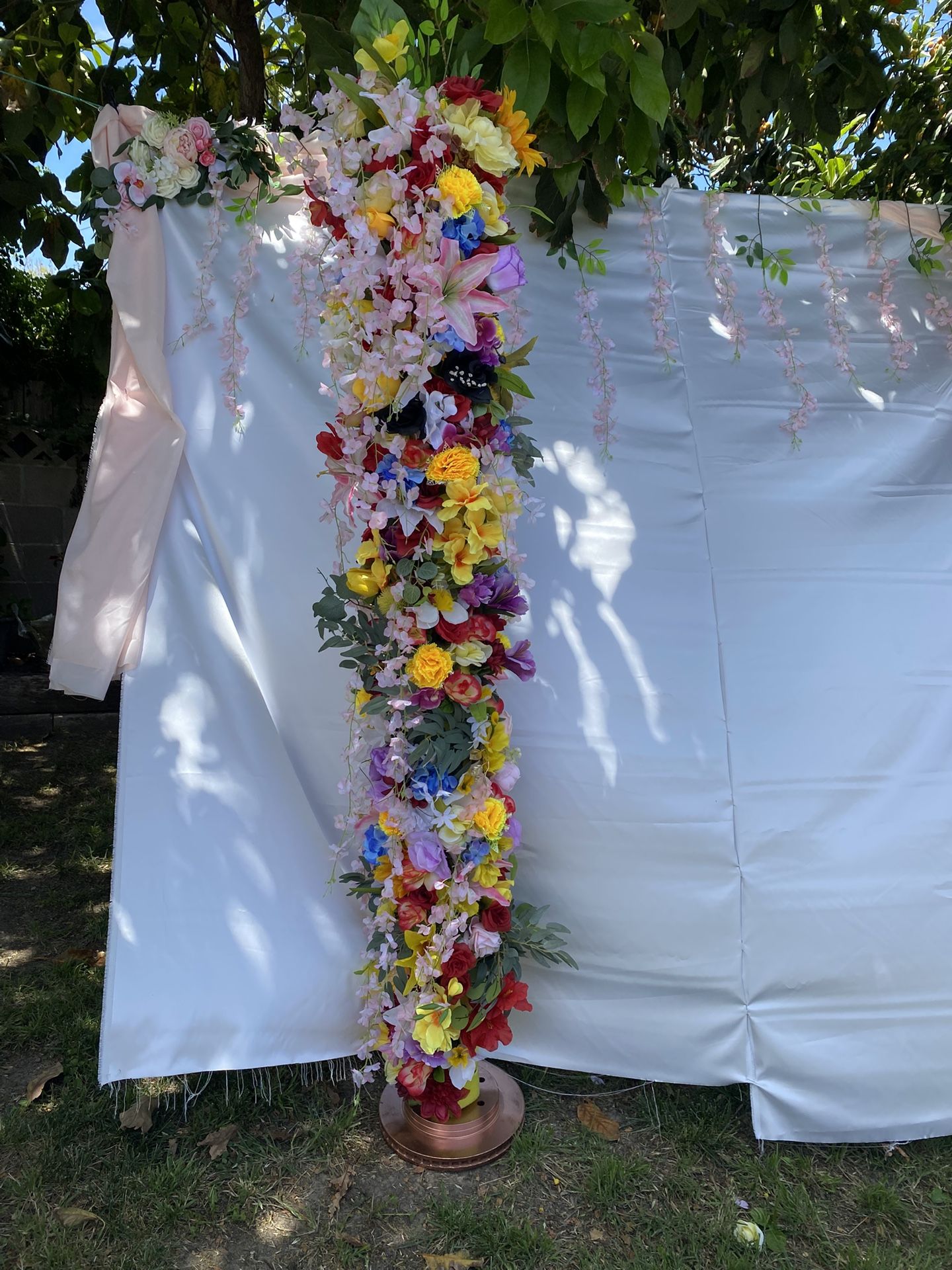 Photo backdrop and flower arrangement/ stand