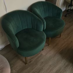 Two Green Lounge Chairs