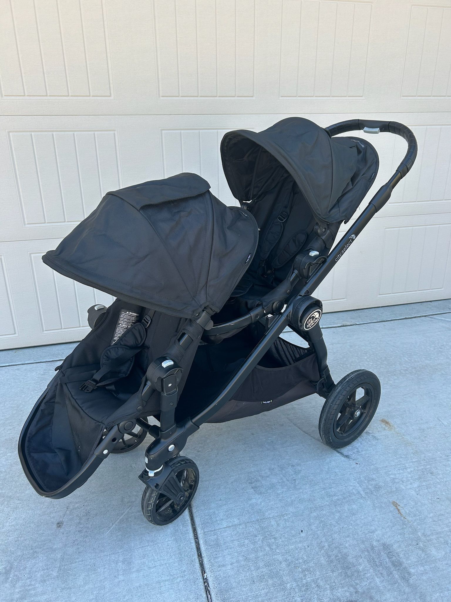 City Select: Baby Jogger Double Stroller  Children up to 45 lb per seat (up to 2 seats)  