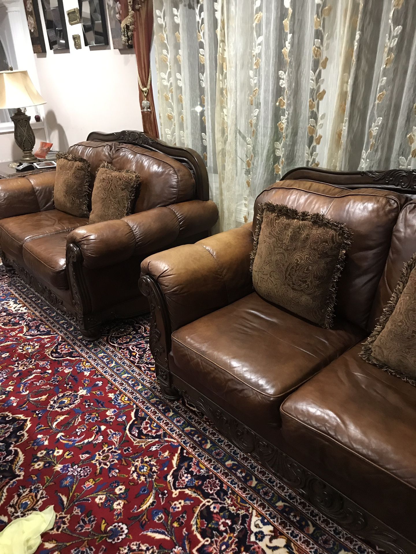 3 leather brown couches and matching coffee table