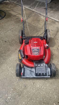 Troy Bilt lawn Moore what does 725 new Briggs & Stratton motor big wheel 22 inch cut self-propelled ready to go no issues