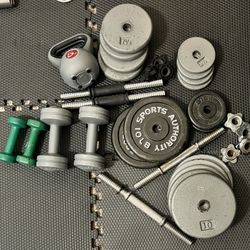 115 Pound Adjustable Dumbbell Set And Accessories
