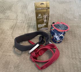 Rock climbing harness, chalk bag and brand new chalk. $75
