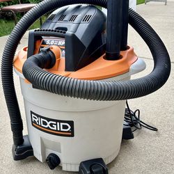 Wet/Dry Shop Vacuum by Rigid -16 Gallon 5.0 HP. Also With Blowing port.  Used Condition.  