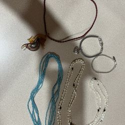 Lot of random and pretty jewelry. Brighton bracelet among the lot. 2 strands of seed pearls, and more