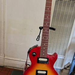 EPIPHONE LES PAUL STUDIO LT ELECTRIC GUITAR MODEL STUDIO LT E1 MADE IN KOREA IN CHERRY BURST COLOR.