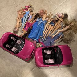2 Pink Barbie Cars And About 14 Dolls And Some Clothes 