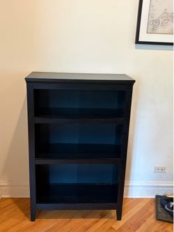 2 black bookcases