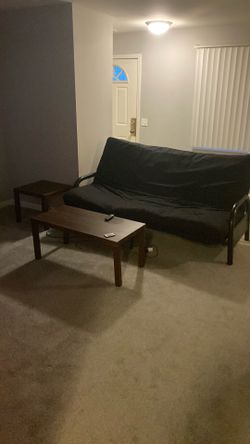 Futon with coffee table and end table