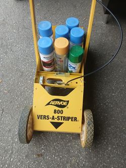 "Máquina trazadora de líneas Aervoe 800 Versa Striper + 7 latas de pintura".