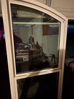 Vinyl eyebrow shaped window