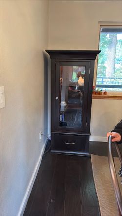 Two Wood display cabinet with three shelves and drawer