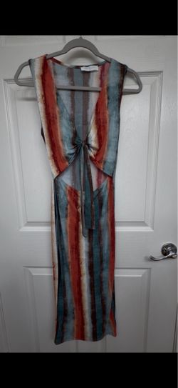 Blue, orange, and white vertical striped midi dress with tie front detail