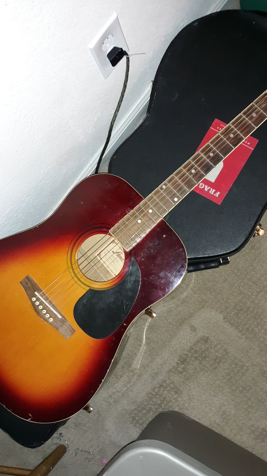 acoustic guitar plus case