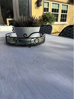 Backyard dining table can seat 8.