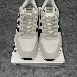 Size 11, men’s brand new unworn Adidas shoes with tags and box