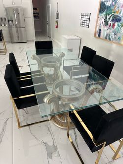 Huge glass table and chairs