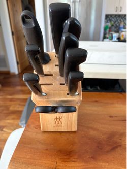 Henkels block and several Henkels knives
