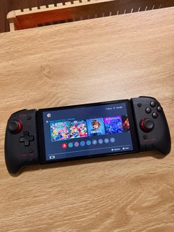 Nintendo Switch with Hori Split Pad Pro + 4 controllers and games