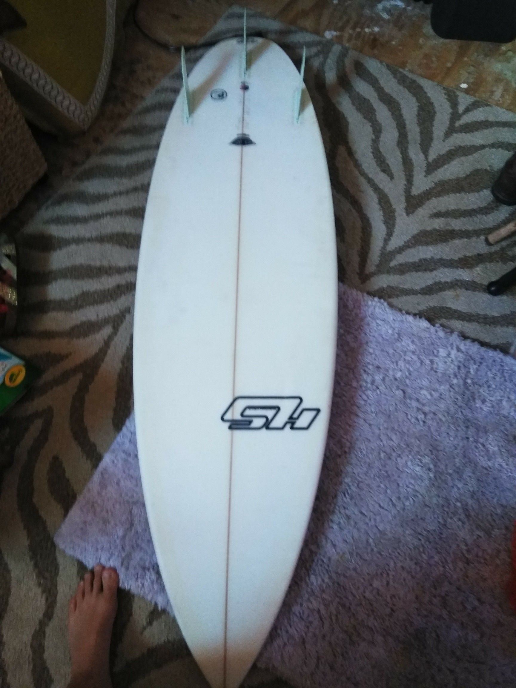 5'8" haydenshapes surfboard