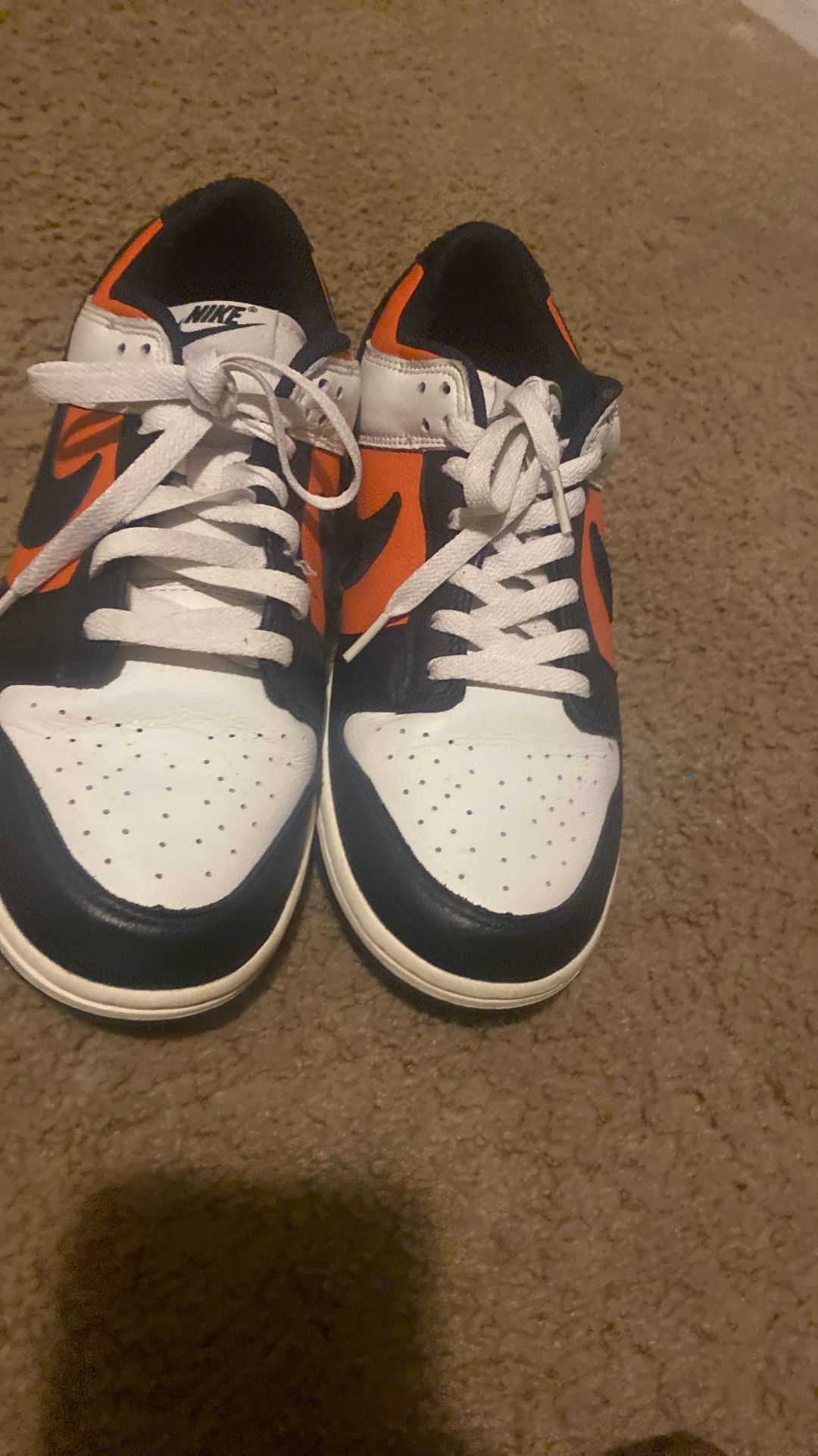 Nike Black, White, And orange shoes No scuffs Or marks
