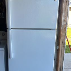 GE apartment size refrigerator in good working conditions asking
