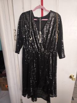 BEAUTIFUL DRESS  BLACK SEQUIN WITH JEWELRY.  HAPPY HOLLIDAYS