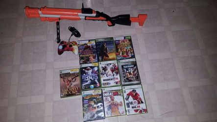 10 Xbox 360 games,gun,and controller