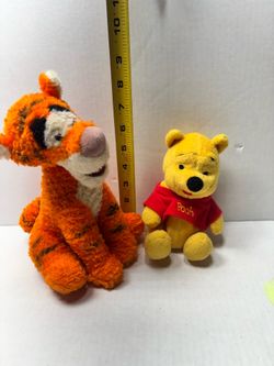 Disney tigger fuzzy plush and Pooh beanbag plush